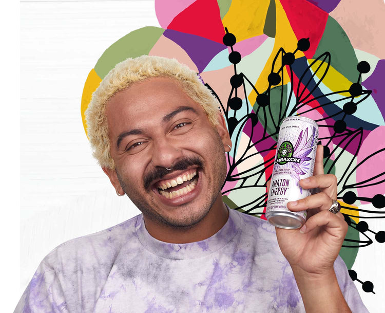 Man smiling and holding can of natural energy drinks