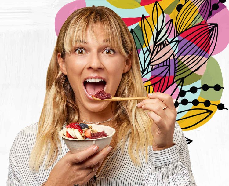 Girl eating Costco acai bowl with spoon