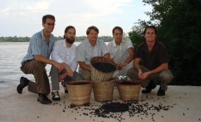SAMBAZON pioneers gathered around fresh picked Açaí