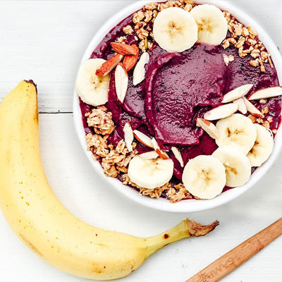 a thick smoothie bowl with frozen banana